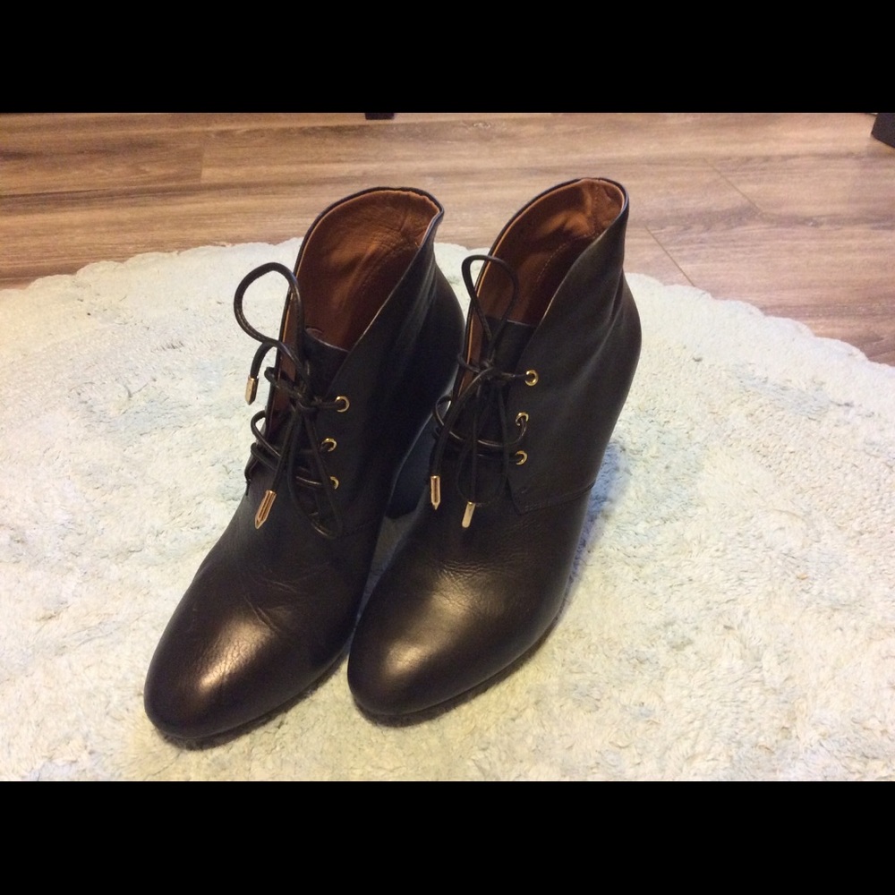Black high heel leather boots